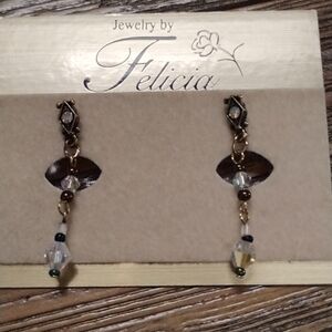 Earrings by Felicia never worn crystal stones